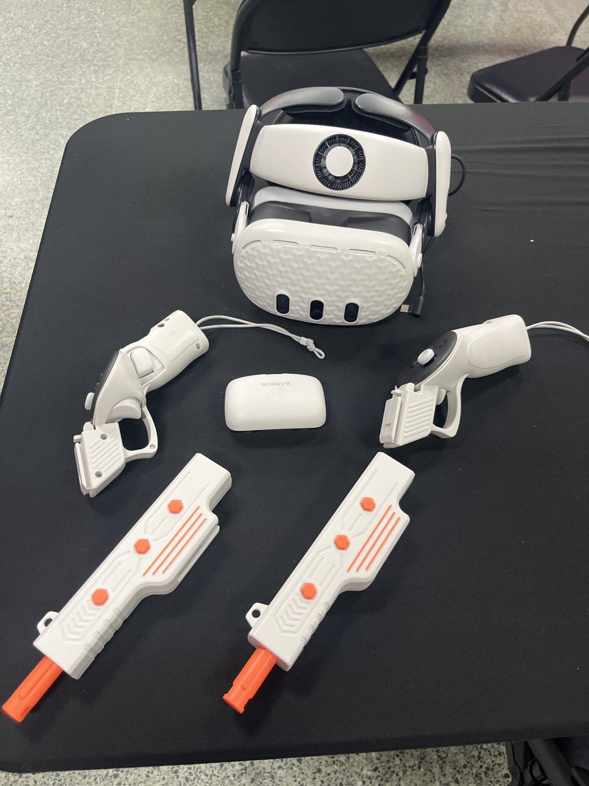 Meta quest 3 with extra battery, head fan and gun attachments