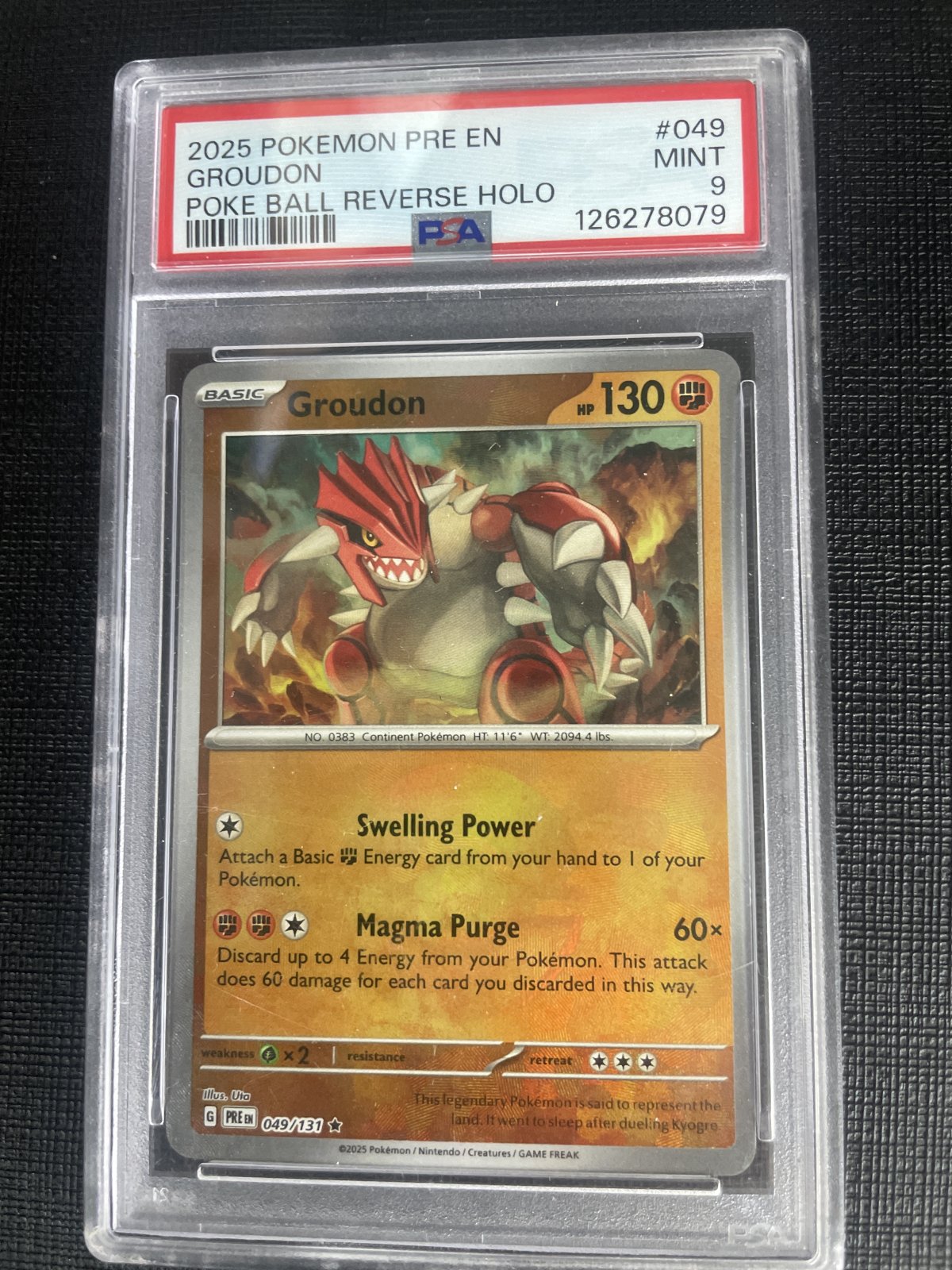 Pokemon Groudon Prismatic Evolutions 049/131 Master Ball Reverse Holo PSA 9 Mint
